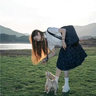 彼女
